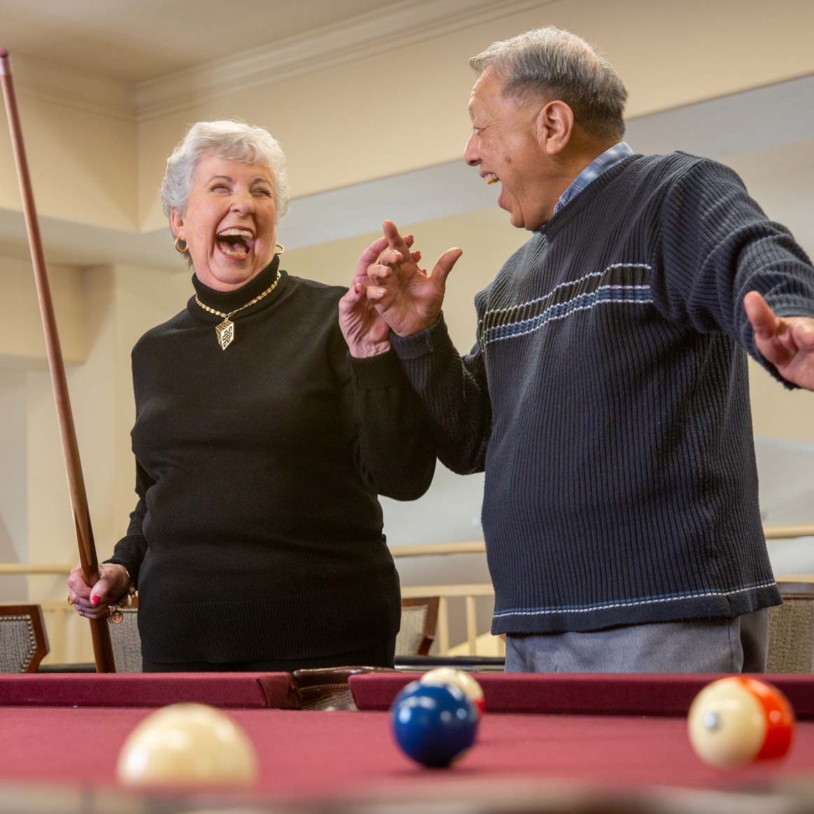 Residents playing billiards at Ashton Gardens